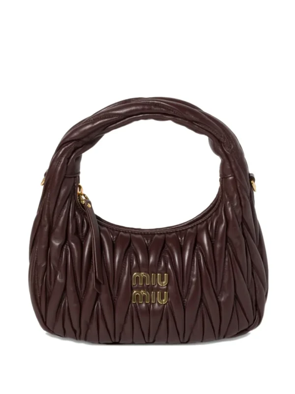 Wander matelassé leather cross body bag